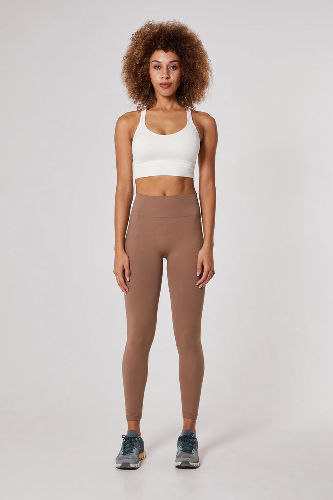 Shop the Ahia Collection: Chic Long Sleeve Tops & Short Brown Jumpsuits ...